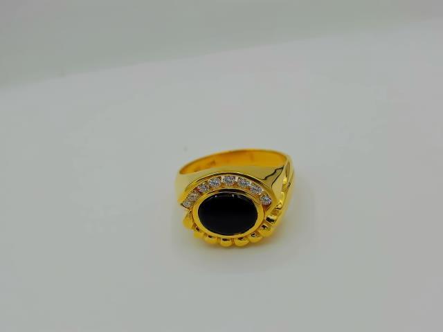 BAGUE AVEC PIERRE NOIR EN OR 10KT