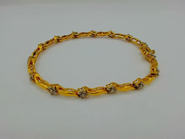 BRACELET EN OR 14KT AVEC DIAM 