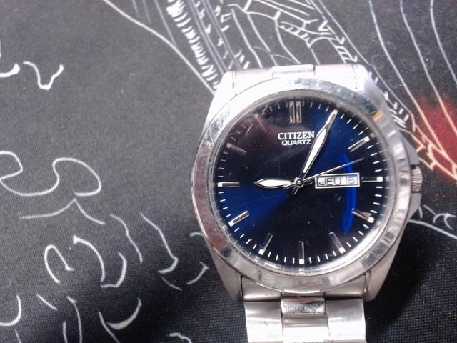 Montre day date citizen blue dial silver