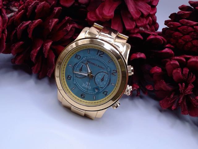 Montre michael kors gold case