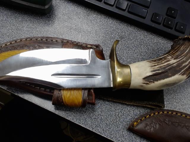 Hunting knife with deer horn handle