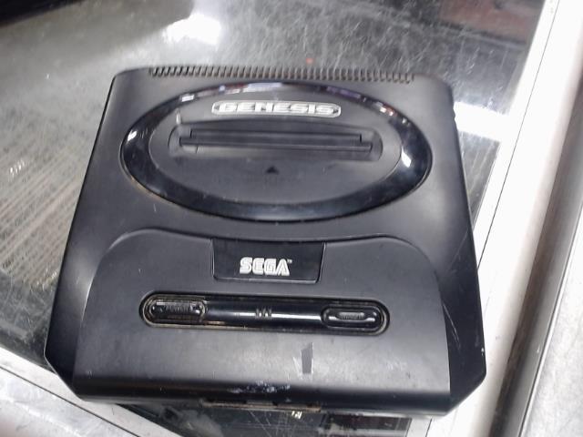 Sega genesis + man + fils