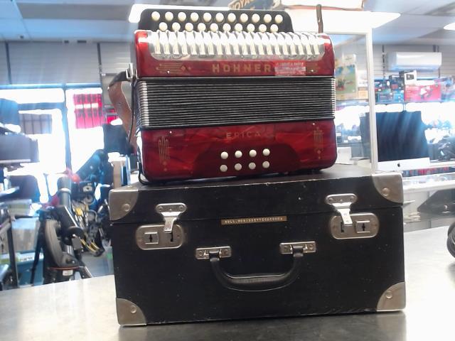 Accordion with red pearl finish