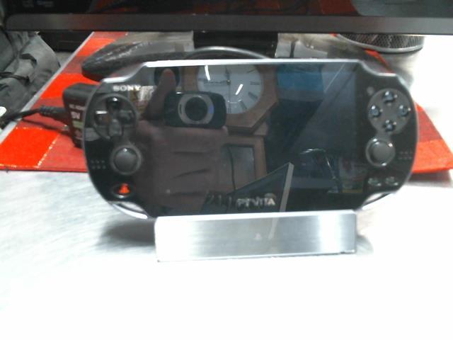 Playstation vita + chrger + dock