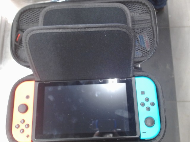 Console nintendo switch+sac+acc+fil