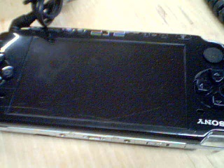 Psp grise avec cahrgeur